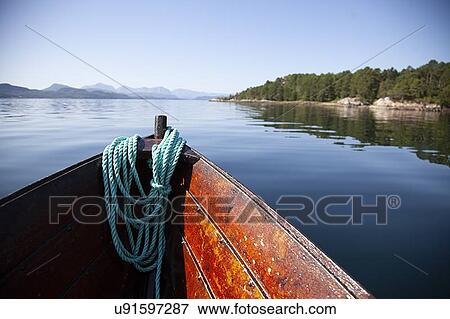 Bow of boat sailing in lake, Finland View Large Photo Image Stock Photo - Bow of boat sailing in lake, Finland. Fotosearch