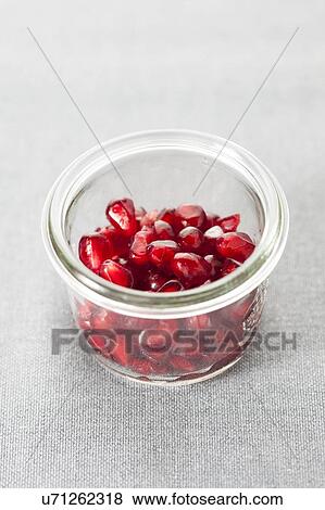 Bowl of pomegranate seeds View Large Photo Image Stock Photo - Bowl of pomegranate seeds. Fotosearch