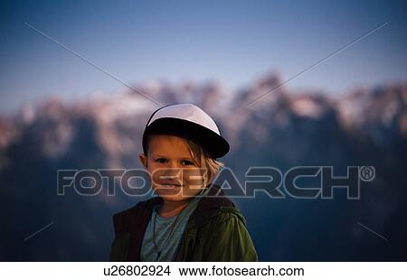 Boy enjoying view on peak, Bludenz, Vorarlberg, Austria View Large Photo Image Picture - Boy enjoying view on peak, Bludenz, Vorarlberg, Austria. Fotosearch
