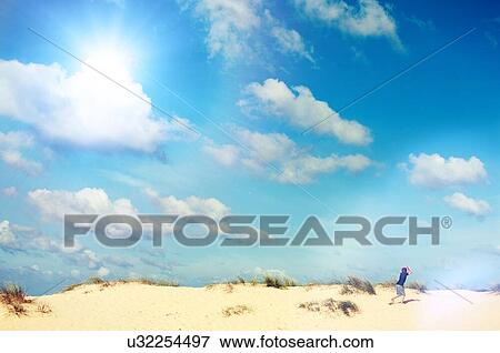Boy Flying Kite on Beach View Large Photo Image Stock Photo - Boy Flying Kite on Beach. Fotosearch