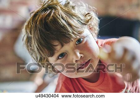 Boy holding hand out View Large Photo Image Picture - Boy holding hand out. Fotosearch