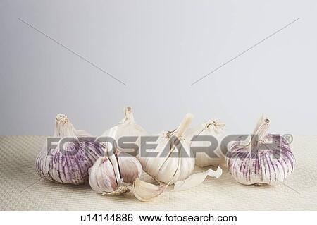Stock Photograph - Bulbs of garlic. Fotosearch