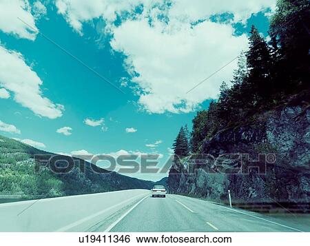 Stock Photograph - Car on highway. Fotosearch