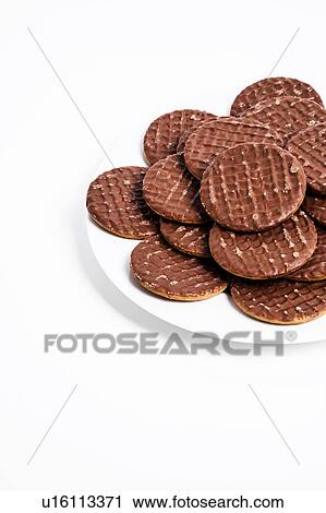 Stock Image - Chocolate biscuits on plate. Fotosearch