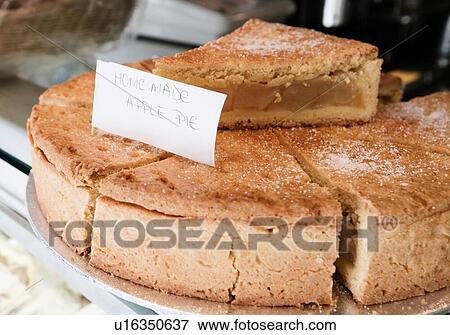 Close-up of apple pie on display case View Large Photo Image Stock Photo - Close-up of apple pie on display case. Fotosearch