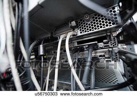 Close-up of data cable plug connected to servers in computer lab View Large Photo Image Stock Image - Close-up of data cable plug connected to servers in computer lab. Fotosearch