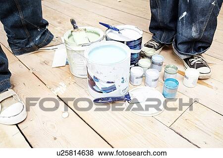 Close up of people and opened paint tins and brushes View Large Photo Image Stock Photo - Close up of people and opened paint tins and brushes. Fotosearch