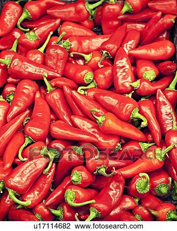 Stock Image - Close-up of red chili peppers. Fotosearch