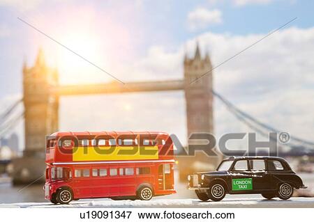 Close-up view of public transport figurines with Tower Bridge in the background View Large Photo Image Stock Photo - Close-up view of public transport figurines with Tower Bridge in the background. Fotosearch