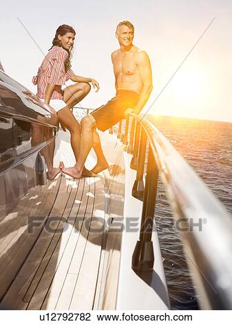 Stock Image - Couple on a Boat. Fotosearch