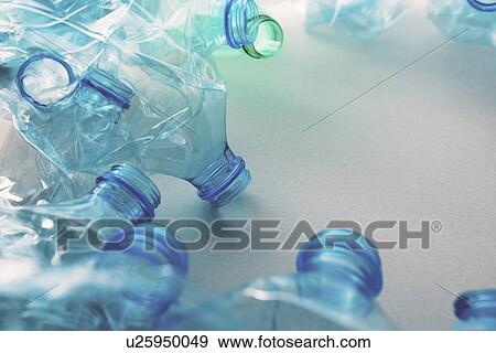Stock Photo - Crushed plastic bottles. Fotosearch