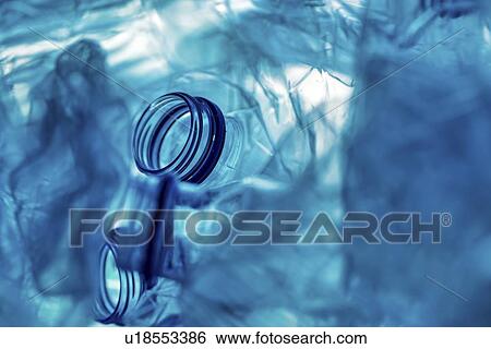 Stock Photograph - Crushed plastic bottles. Fotosearch