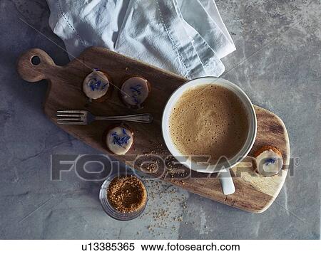 Cup of coffee and cookies on wooden board View Large Photo Image Stock Photography - Cup of coffee and cookies on wooden board. Fotosearch