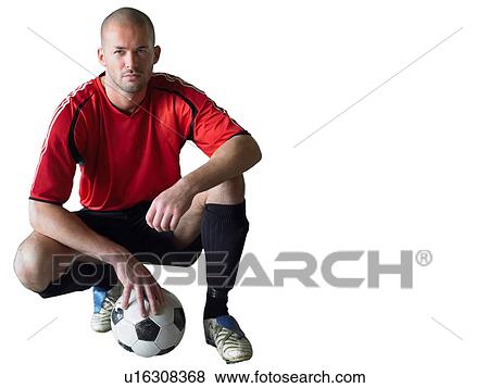 Stock Photo - Cut Out of Soccer Player with football. Fotosearch