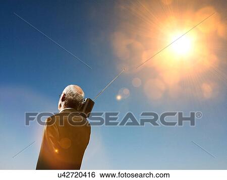 Elderly business man using radio in summer View Large Photo Image Stock Photograph - Elderly business man using radio in summer. Fotosearch