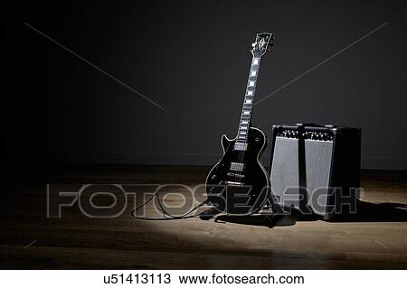 Electric guitar and amplifier View Large Photo Image Stock Image - Electric guitar and amplifier. Fotosearch