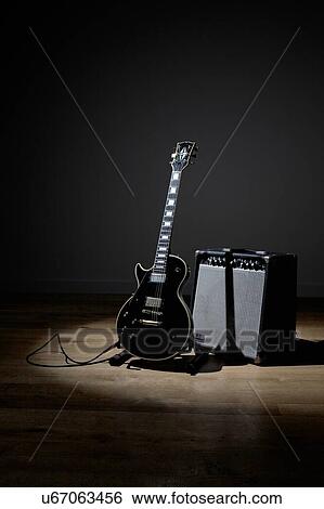 Electric guitar and amplifier View Large Photo Image Stock Photograph - Electric guitar and amplifier. Fotosearch