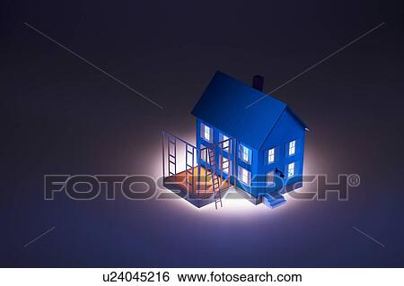 Stock Photograph - Extending little blue model house with ladder. Fotosearch