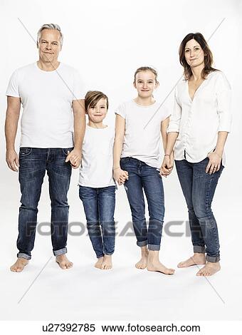 Family of four, white background View Large Photo Image Stock Photography - Family of four, white background. Fotosearch