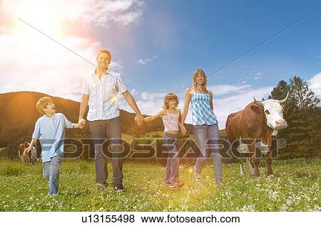 Stock Photo - Farming family in countryside. Fotosearch