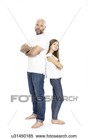 Father and daughter with arms crossed, white background View Large Photo Image Stock Photography - Father and daughter with arms crossed, white background. Fotosearch