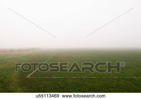Stock Photo - Fog above soccer field. Fotosearch