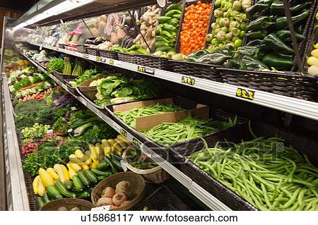 Stock Photo - Fresh vegetables on display in farmer's market. Fotosearch