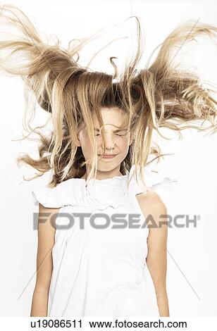 Girl with flying hair, white background View Large Photo Image Stock Image - Girl with flying hair, white background. Fotosearch