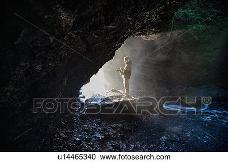 Stock Image - Glufrabui waterfall (Seljalandsfoss), Iceland. Fotosearch