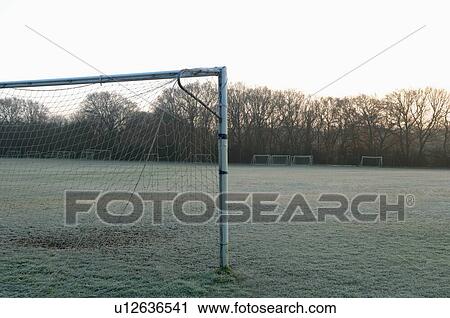 Goal post on empty soccer field View Large Photo Image Stock Image - Goal post on empty soccer field. Fotosearch