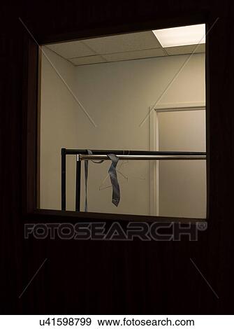 Stock Photo - Hanging Tangled in Office. Fotosearch