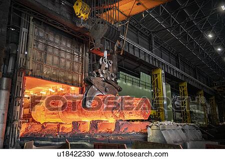 Heat treated red hot steel ingot being lifted by crane in furnace in steelworks View Large Photo Image Stock Image - Heat treated red hot steel ingot being lifted by crane in furnace in steelworks. Fotosearch
