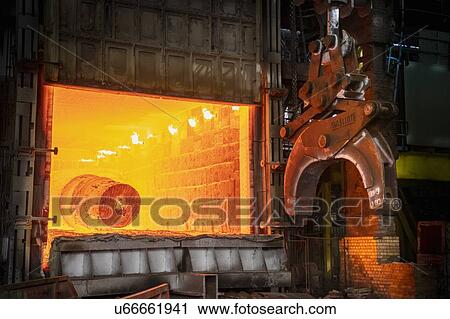 Heat treated red hot steel ingot being lifted by crane in furnace in steelworks View Large Photo Image Stock Image - Heat treated red hot steel ingot being lifted by crane in furnace in steelworks. Fotosearch