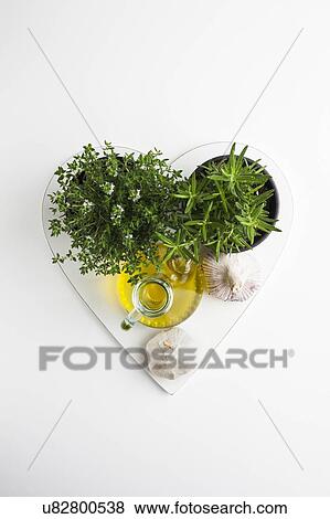 Herbs, garlic and olive oil View Large Photo Image Stock Photo - Herbs, garlic and olive oil. Fotosearch