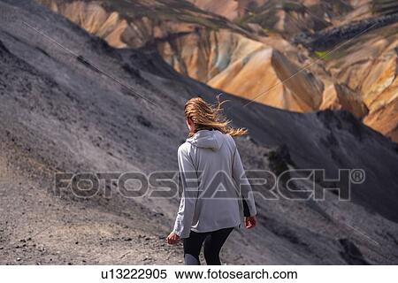Hiker exploring mountains, Brennisteinsalda and Blhnjkur, Landmannalaugar, Highlands, Iceland View Large Photo Image Stock Photography - Hiker exploring mountains, Brennisteinsalda and Blhnjkur, Landmannalaugar, Highlands, Iceland. Fotosearch