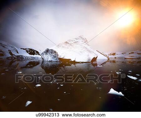 Iceberg melting due to global warming View Large Photo Image Stock Image - Iceberg melting due to global warming. Fotosearch