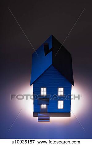 Stock Photo - Illuminated model house. Fotosearch