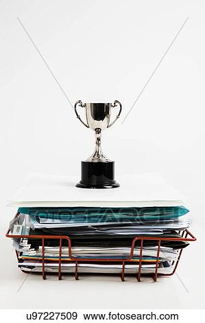 Stock Photo - Inbox Tray with trophy. Fotosearch
