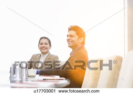 Indian businessman and woman in meeting View Large Photo Image Stock Image - Indian businessman and woman in meeting. Fotosearch