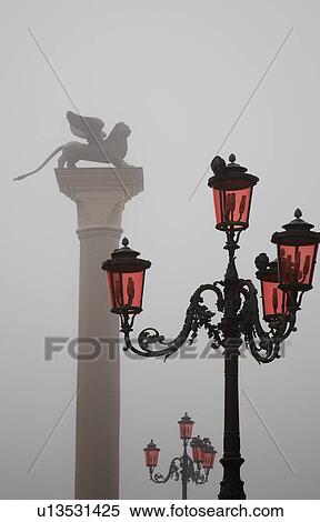 Italy Venice Lion of St. Marks and street lights View Large Photo Image Stock Photography - Italy Venice Lion of St. Marks and street lights. Fotosearch