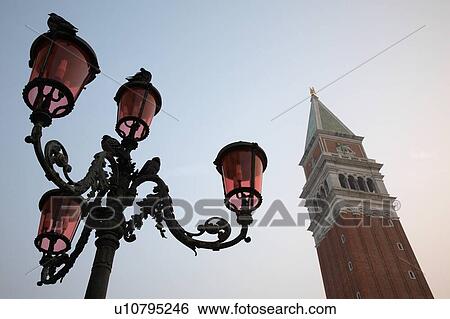 Stock Photograph - Italy Venice San Giorgio Maggiore tower and lamp post low angle view. Fotosearch