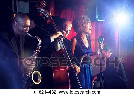 Stock Image - Jazz Band playing on Stage. Fotosearch