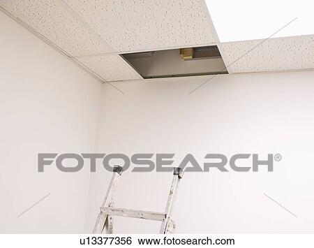 Ladder in Below Open Ceiling Panel in Empty Office View Large Photo Image Stock Photograph - Ladder in Below Open Ceiling Panel in Empty Office. Fotosearch