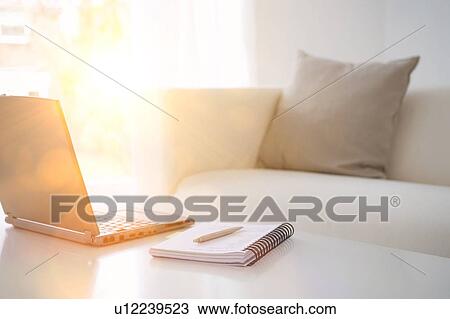 Laptop and notebook on table View Large Photo Image Stock Image - Laptop and notebook on table. Fotosearch