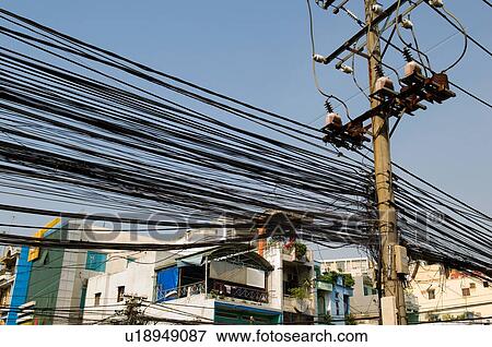 Stock Photo - Large Group of Power Lines in City. Fotosearch