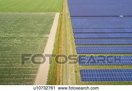 Stock Image - Large solar farms, Andijk, Noord-Holland, Netherlands. Fotosearch