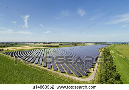Large solar farms, Andijk, Noord-Holland, Netherlands View Large Photo Image Stock Image - Large solar farms, Andijk, Noord-Holland, Netherlands. Fotosearch