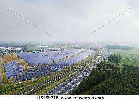 Stock Photo - Large solar farms, Andijk, Noord-Holland, Netherlands. Fotosearch