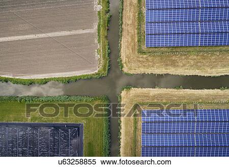 Stock Photography - Large solar farms, Andijk, Noord-Holland, Netherlands. Fotosearch