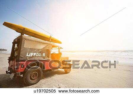 Stock Photography - Lifeguard vehicle at Anjuna Beach, Goa, India. Fotosearch